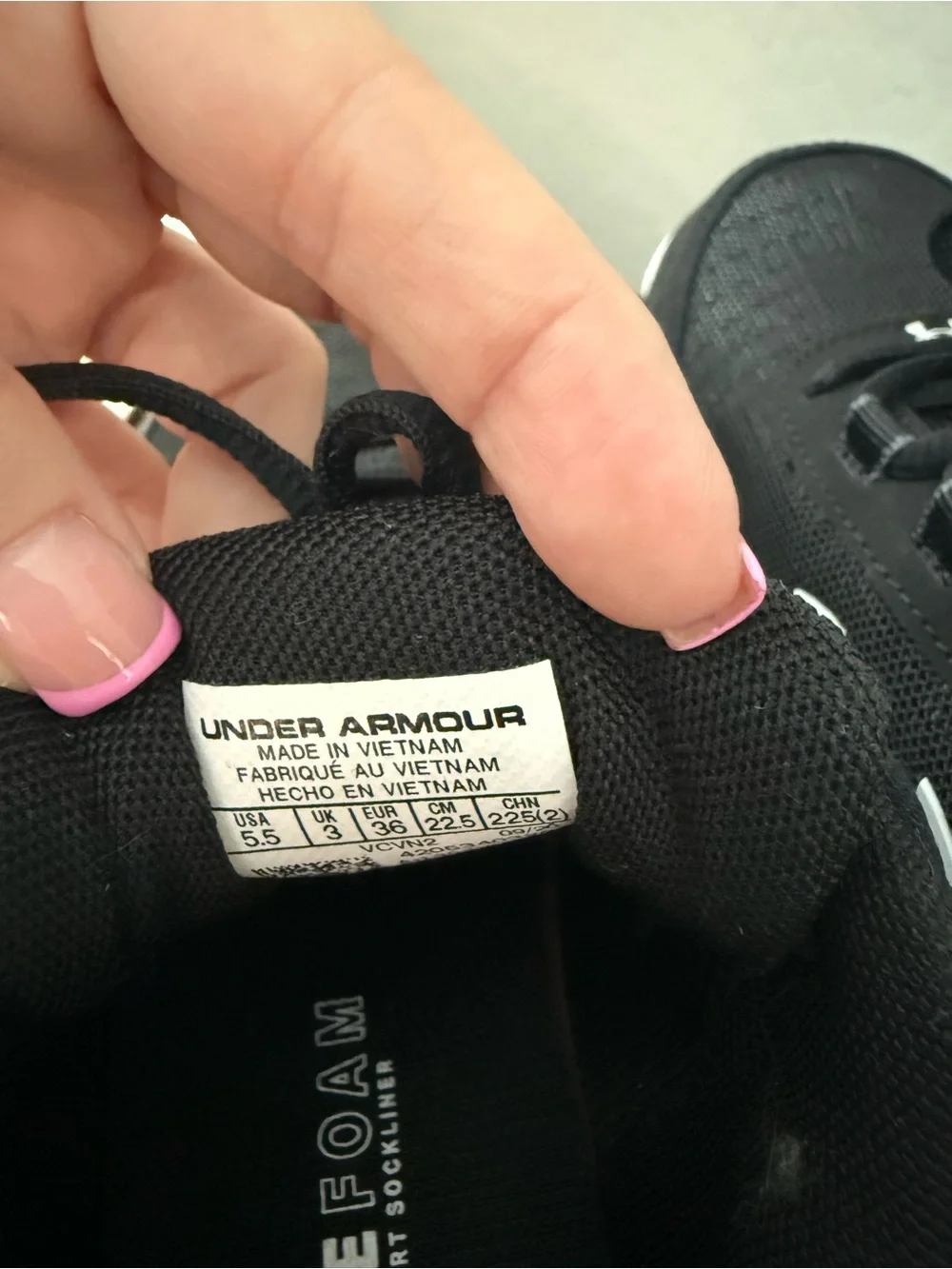 Under Armour Women’s Black and White Athletic Sneakers